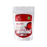 Packaging of NatureMills Red Chilli Powder, showing the product name and an image of red chilies on the front.