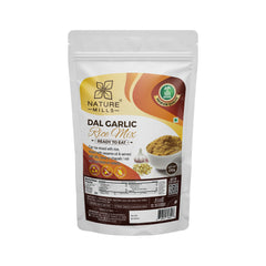 Nature Mills Dal Garlic Rice Mix packaging on a white background